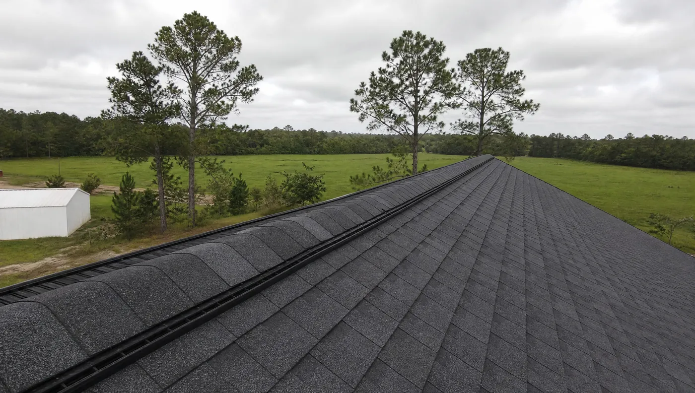 Completed architectural shingle roof replacement with ridge vent in Rosharon TX
