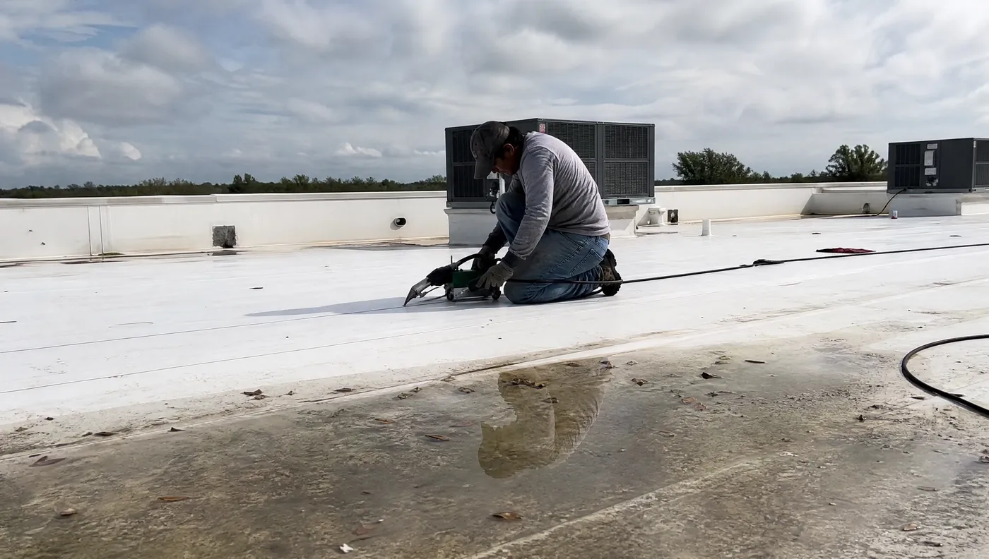 TPO single ply membrane flat roof repair on a commercial building in Rosharon TX