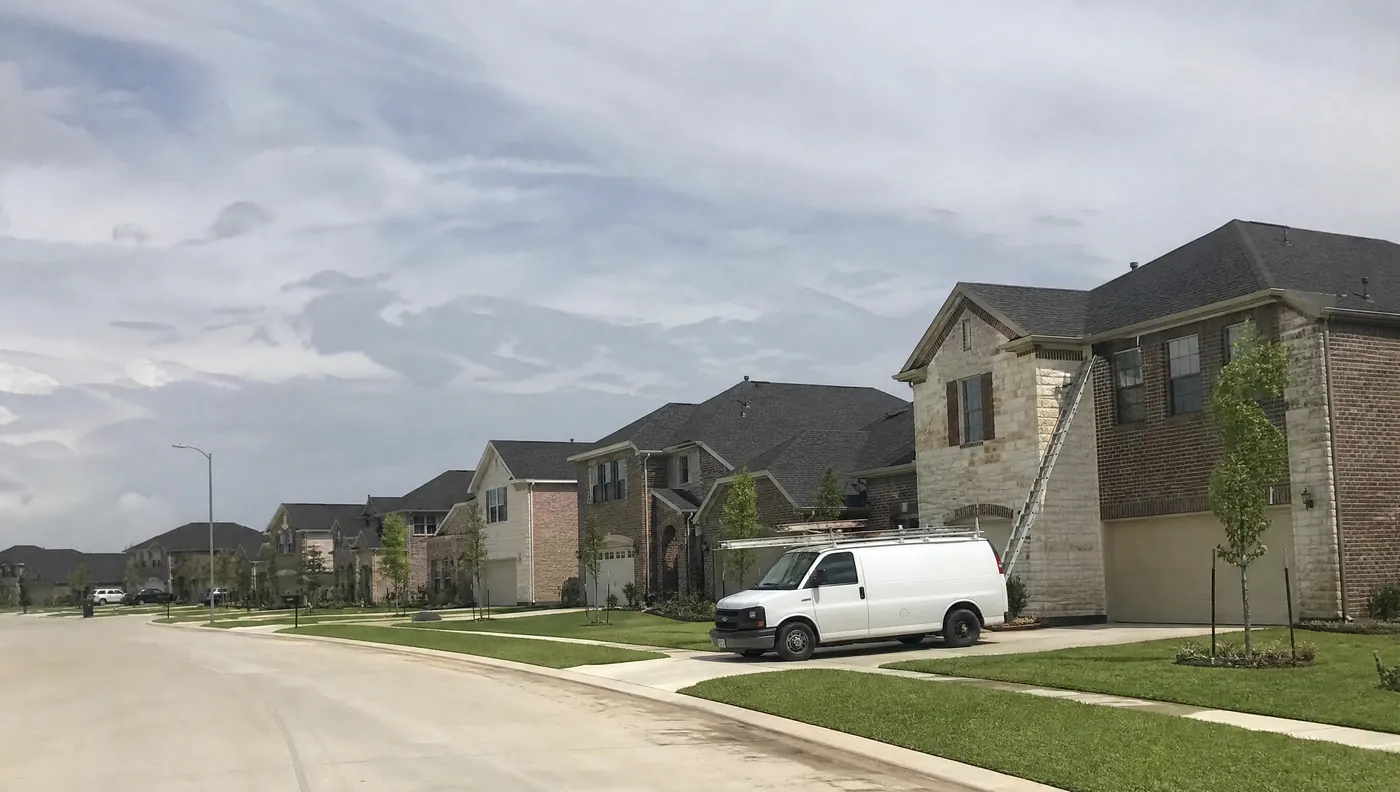 Roof replacement on a new-build home in a Meridiana or Sierra Vista style community, Iowa Colony TX