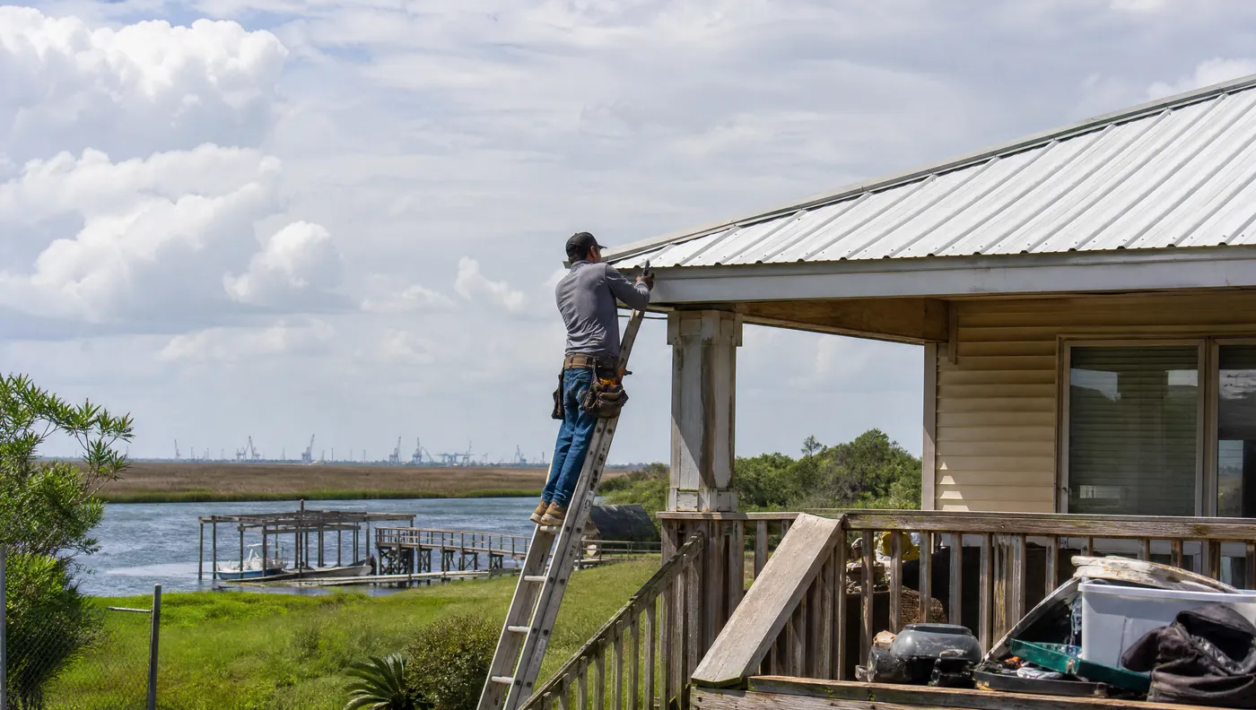 Roof replacement on a waterfront-adjacent home in Liverpool Texas near Chocolate Bayou